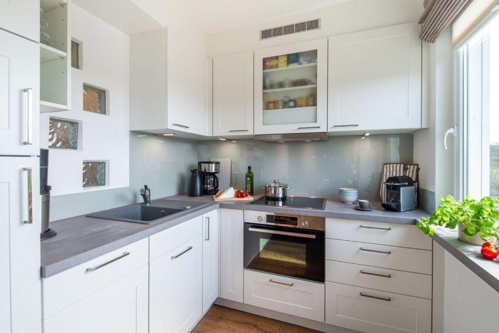 Appartement-Leuchtturmblick เฮอร์นุม ภายนอก รูปภาพ
